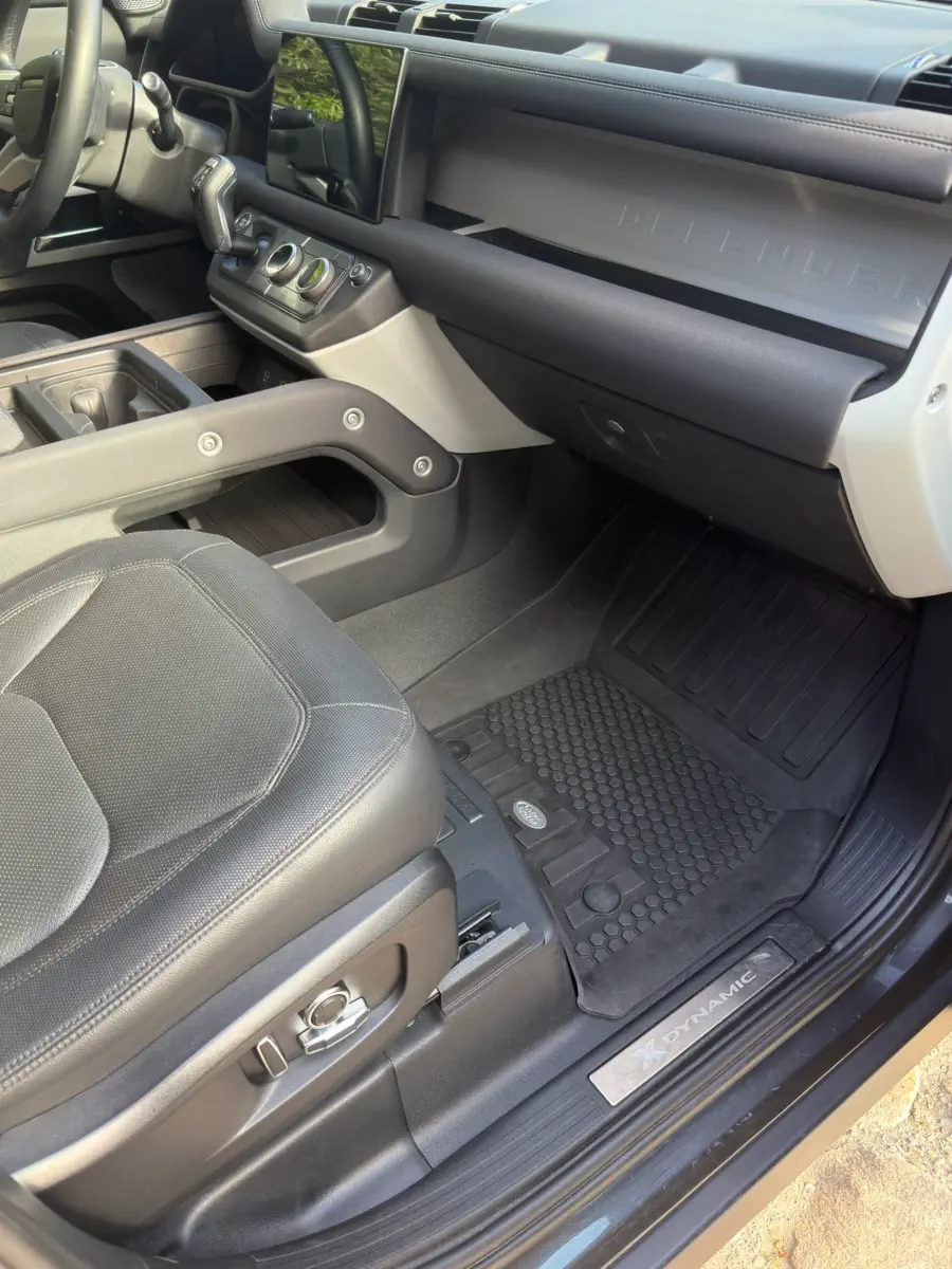 After: passenger footwell with the mat and sill plate clean